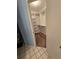 Walk-in closet with white shelving and storage options; spacious room at 10825 Venice Cir, Tampa, FL 33635