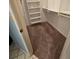 Walk-in closet with white shelving and storage options; spacious room at 10825 Venice Cir, Tampa, FL 33635