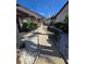 Landscaped walkway with decorative stone leading to the front entrance of the home at 10825 Venice Cir, Tampa, FL 33635