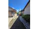 Stone walkway with trimmed shrubs leads to the inviting entrance of the home at 10825 Venice Cir, Tampa, FL 33635