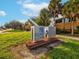 Dunedin Fine Art Center sign with palm trees and a blue sky in the background at 1211 Penny Ct, Dunedin, FL 34698