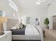 Spacious bedroom with high ceilings, neutral colors, and ample natural light at 1211 Penny Ct, Dunedin, FL 34698