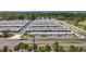 Aerial view of community with palm trees and neighborhood streets at 12400 Park Blvd # 121, Seminole, FL 33772