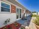 Back porch with sliding glass door and chair at 12400 Park Blvd # 121, Seminole, FL 33772