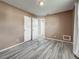 Cozy bedroom featuring neutral walls, modern flooring, and a spacious closet for ample storage at 12400 Park Blvd # 121, Seminole, FL 33772