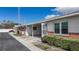 Well-kept villa with carport, brick accents, and easy access to a neat sidewalk at 12400 Park Blvd # 121, Seminole, FL 33772