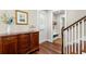 Elegant foyer with rich hardwood floors, a beautiful buffet, and a stairway at 1511 47Th N Ave, St Petersburg, FL 33703