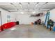 Spacious garage interior with ample storage, overhead racks, and room for a workshop or recreational equipment at 1511 47Th N Ave, St Petersburg, FL 33703