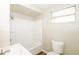 Well-lit bathroom featuring a tub-shower combo, and a modern vanity sink at 1602 E New Orleans Ave, Tampa, FL 33610