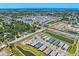 Breathtaking aerial view capturing a community with contemporary homes, peaceful ponds, and a desirable coastal setting at 17920 Nadine Pl, Nokomis, FL 34275