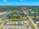 Picturesque aerial view of the neighborhood showcasing the community, pool, and surrounding nature at 17920 Nadine Pl, Nokomis, FL 34275