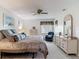 Bright bedroom featuring a ceiling fan, and a large white dresser at 2011 Halidom Way # 0, Sun City Center, FL 33573