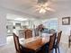 Open-concept dining area with seating for six, seamlessly connected to the kitchen at 2011 Halidom Way # 0, Sun City Center, FL 33573