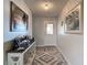 Bright entryway featuring a light gray color scheme, framed art, and a decorative console table at 2011 Halidom Way # 0, Sun City Center, FL 33573