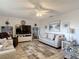 Comfortable living room with neutral-toned furniture and a large television at 2011 Halidom Way # 0, Sun City Center, FL 33573