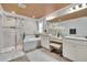Luxurious bathroom showcasing a double vanity, soaking tub and glass shower at 2117 Lake Waters Pl, Lutz, FL 33558
