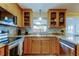Featuring an updated kitchen with stainless steel appliances, granite countertops, and plenty of storage at 2131 Cedar Dr, Dunedin, FL 34698