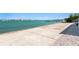 Waterfront backyard with pier and open water at 2171 E Vina Del Mar Blvd, St Pete Beach, FL 33706