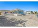 Exterior of home with waterfront access, boat, and beautiful views at 2171 E Vina Del Mar Blvd, St Pete Beach, FL 33706