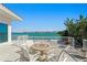 Waterfront patio overlooking the bay with outdoor seating at 2171 E Vina Del Mar Blvd, St Pete Beach, FL 33706