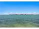 Expansive view of open water and the sky beyond with a distant bridge at 2171 E Vina Del Mar Blvd, St Pete Beach, FL 33706