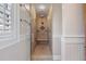 Walk-in shower stall with tiled walls and floor, along with a bench seat at 2320 Coffee Pot Ne Blvd, St Petersburg, FL 33704
