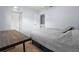 Bedroom with a large window, ample closet space, and neutral carpeting at 25 Woods Landing Trl, Oldsmar, FL 34677