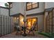 Back patio featuring comfortable chairs and a dining table at 25 Woods Landing Trl, Oldsmar, FL 34677