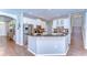 Spacious kitchen with white cabinets, granite counters, stainless steel appliances, and open layout at 2515 Cross More St, Valrico, FL 33594
