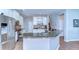 Modern kitchen featuring granite countertops, stainless steel appliances, and ample cabinet space at 2515 Cross More St, Valrico, FL 33594