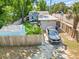 Features a well-maintained fenced yard, small deck, and a convenient detached garage with a parking space at 2751 36Th N Ave, St Petersburg, FL 33713