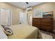 Comfortable bedroom with a decorative rug, a flatscreen TV, and an ensuite bathroom at 2751 36Th N Ave, St Petersburg, FL 33713
