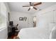 Bright bedroom features ceiling fan, and a desk and chair for study or work at 2751 36Th N Ave, St Petersburg, FL 33713