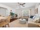 Open concept living room with a TV, sectional sofa, and hardwood floors at 2751 36Th N Ave, St Petersburg, FL 33713