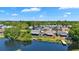 Picturesque waterfront community with beautiful blue water and lush green trees creating a peaceful oasis at 3106 Whispering S Dr, Largo, FL 33771