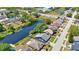 Charming community with waterfront homes and mature trees, offering a serene and picturesque setting at 3106 Whispering S Dr, Largo, FL 33771