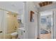 Bathroom featuring a shower/tub, updated vanity, built-in shelving for storage, and a neutral color palette at 3106 Whispering S Dr, Largo, FL 33771