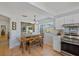 Updated kitchen with stainless steel appliances and view to living room at 3106 Whispering S Dr, Largo, FL 33771