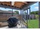 Screened patio with outdoor grill, and backyard access at 3106 Whispering S Dr, Largo, FL 33771