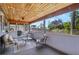 Relaxing screened patio with comfortable seating and bright, natural sunlight at 3106 Whispering S Dr, Largo, FL 33771
