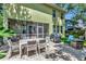Spacious backyard featuring outdoor dining, grilling area, and landscaped features at 3408 W Bay Ave, Tampa, FL 33611