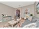 Comfortable living room featuring neutral walls, wood flooring, and contemporary decor, creating a cozy atmosphere at 3408 W Bay Ave, Tampa, FL 33611