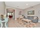 Open-concept living room with an archway leading to other rooms, showcasing hardwood floors and plenty of space at 3408 W Bay Ave, Tampa, FL 33611
