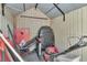 Organized storage shed featuring tools, yard games, and equipment at 3408 W Bay Ave, Tampa, FL 33611