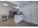 Open concept view of kitchen island and living room offering a welcoming and connected living space at 428 Flamingo Dr, Apollo Beach, FL 33572