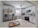 Contemporary kitchen with stainless steel appliances, ample cabinet space, and a bright, clean design at 428 Flamingo Dr, Apollo Beach, FL 33572