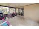 An enclosed back porch with views to the home's interior for easy indoor-outdoor living at 428 Flamingo Dr, Apollo Beach, FL 33572