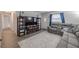 Cozy living room features a comfortable sectional sofa, TV, and stylish decor at 428 Flamingo Dr, Apollo Beach, FL 33572