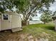 Backyard storage shed offering additional storage solutions and easy access at 428 Flamingo Dr, Apollo Beach, FL 33572