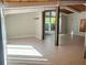 Bright living room featuring tile flooring, wood ceilings and natural light at 4310 7Th S St, St Petersburg, FL 33705